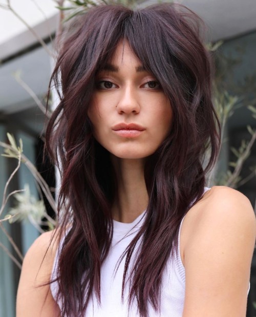 4-tousled-wolf-hairstyle-in-dark-burgundy-tones